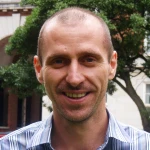 Dr John Hughes PhD, BSc (Hons), Lic. Ac.